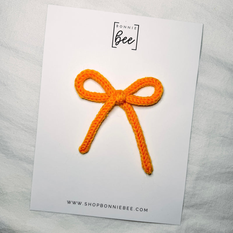 Bright Orange Yarn Bow